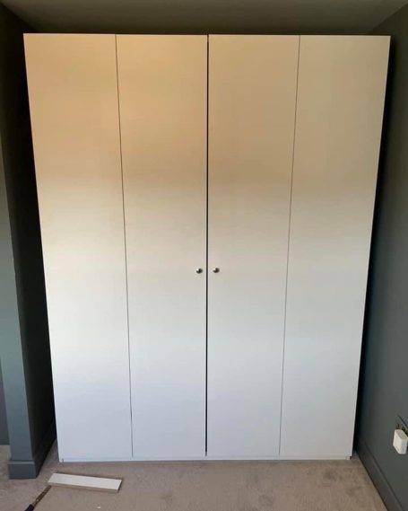 wardrobe with hidden storage bed